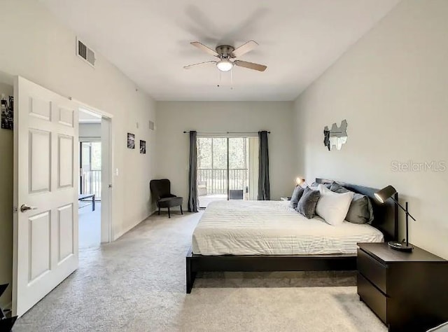 bedroom with ceiling fan, access to outside, and multiple windows