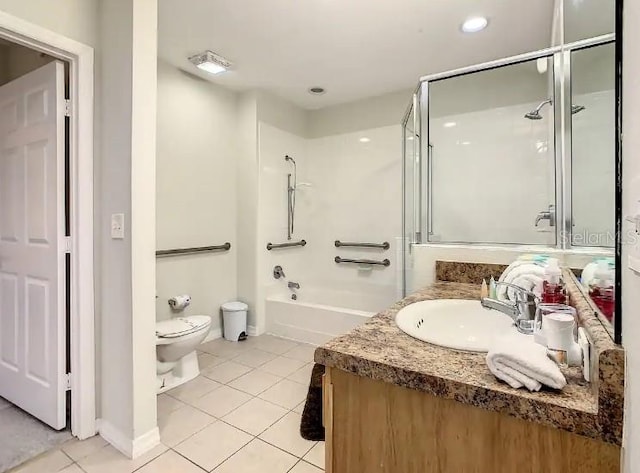 full bathroom with vanity, tile flooring, shower / bath combination with glass door, and toilet