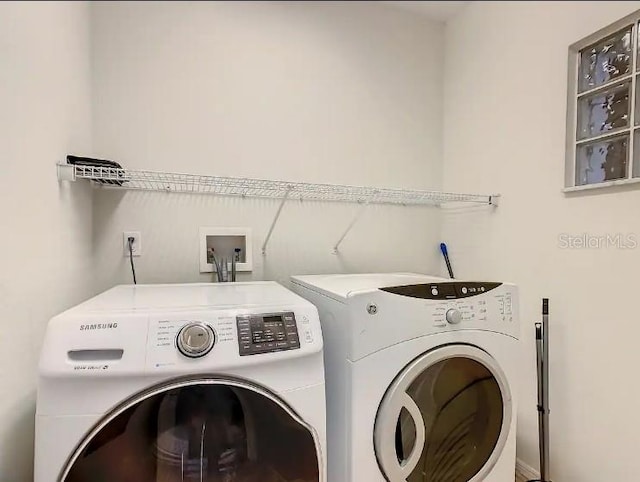 laundry area featuring washing machine and dryer and hookup for a washing machine