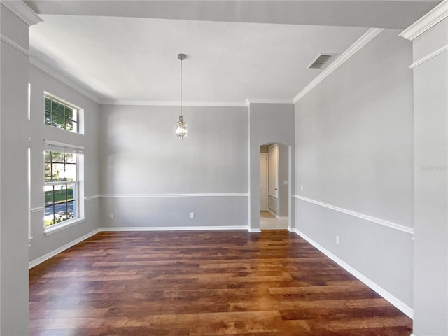 unfurnished room with dark wood-type flooring and ornamental molding