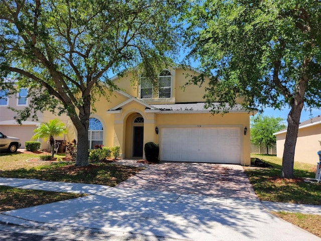 view of front of home featuring a garage