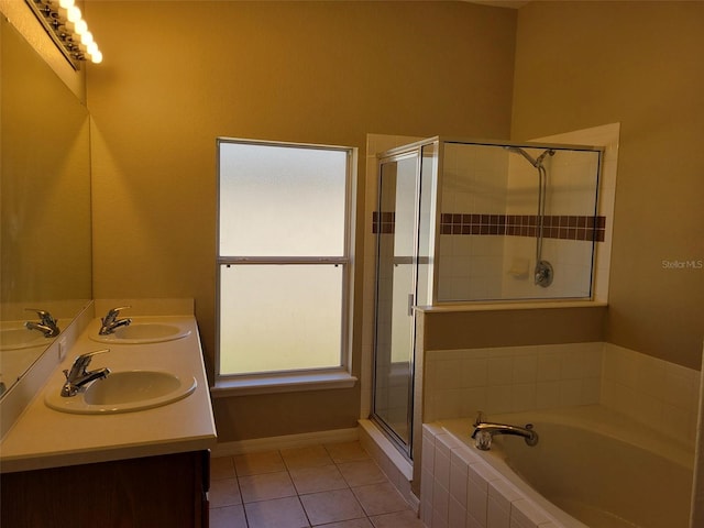 bathroom with tile flooring, separate shower and tub, and dual bowl vanity