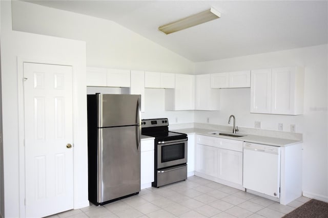 kitchen featuring white cabinetry, stainless steel appliances, vaulted ceiling, and sink