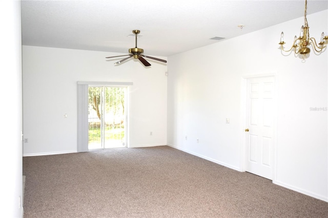 carpeted empty room featuring ceiling fan with notable chandelier