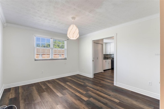 unfurnished room with crown molding, a textured ceiling, and dark hardwood / wood-style flooring