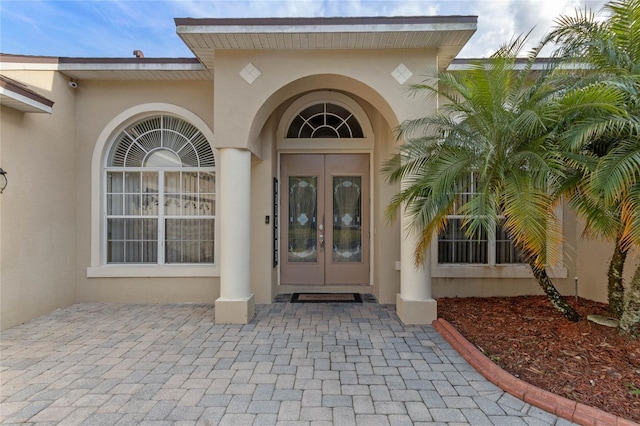 property entrance featuring french doors