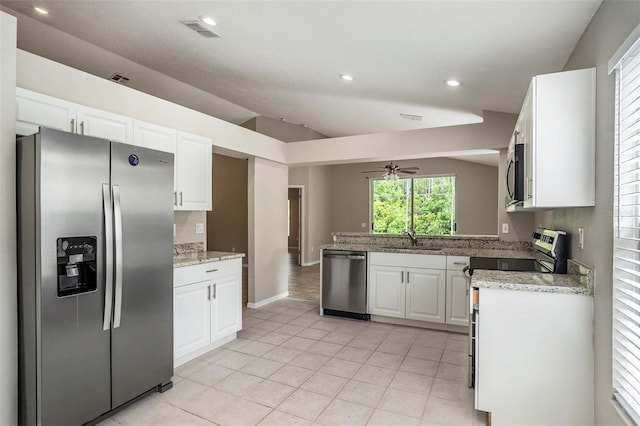 kitchen featuring ceiling fan, sink, light tile flooring, white cabinetry, and stainless steel appliances