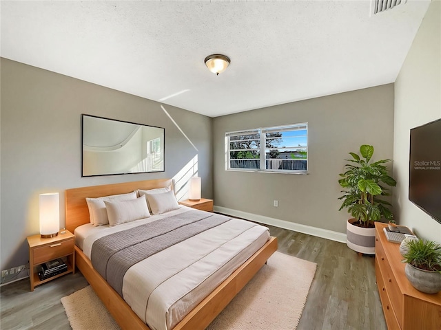 759 Little Wekiva Cir, Altamonte Springs, FL 32714 - bedroom with wood finished floors, visible vents, and baseboards