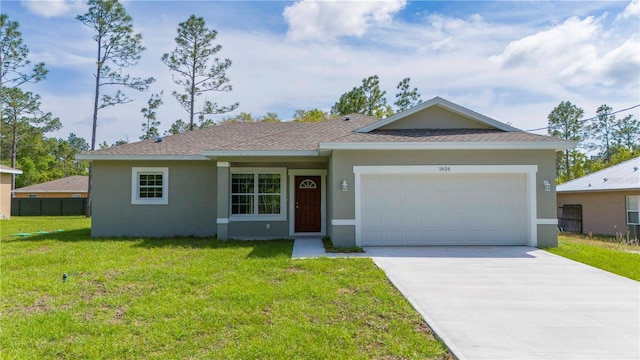 ranch-style house with a garage and a front lawn