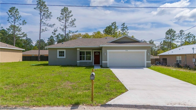 ranch-style home featuring a garage and a front yard