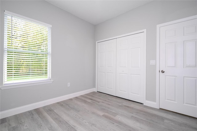 unfurnished bedroom with light hardwood / wood-style flooring