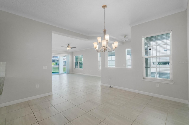 spare room with ornamental molding and light tile floors