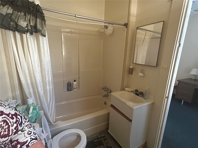 full bathroom with vanity, shower / bath combination with curtain, and toilet