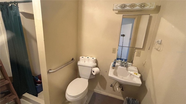 bathroom with toilet and sink