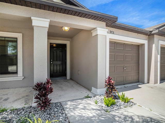 property entrance featuring a garage