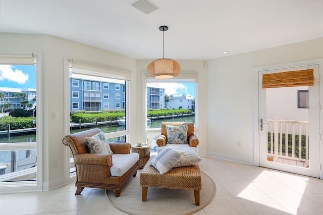 living area with light tile flooring