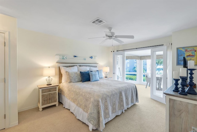 bedroom featuring ceiling fan and light carpet