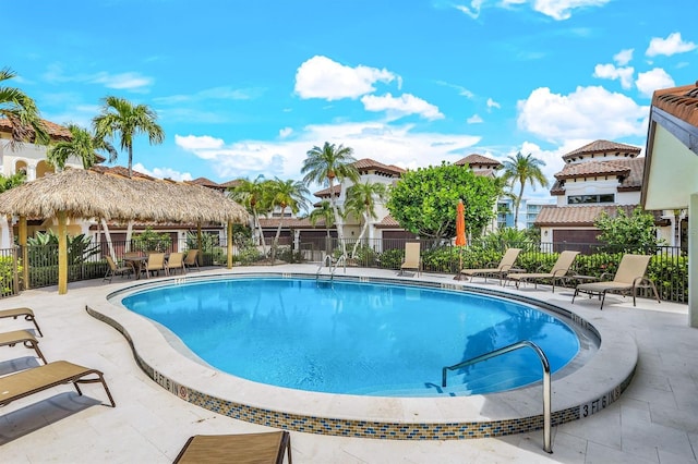 view of swimming pool with a patio