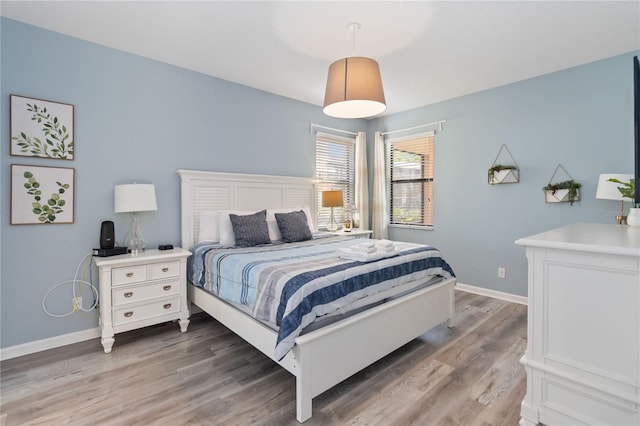 bedroom featuring hardwood / wood-style floors