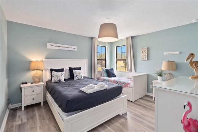 bedroom featuring light hardwood / wood-style flooring