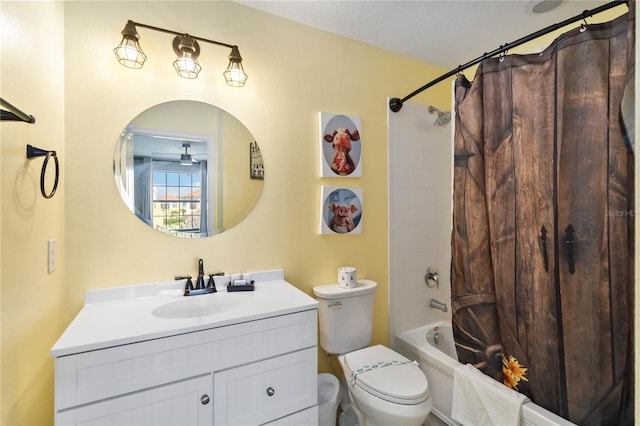 full bathroom featuring toilet, vanity with extensive cabinet space, shower / bathtub combination with curtain, and ceiling fan