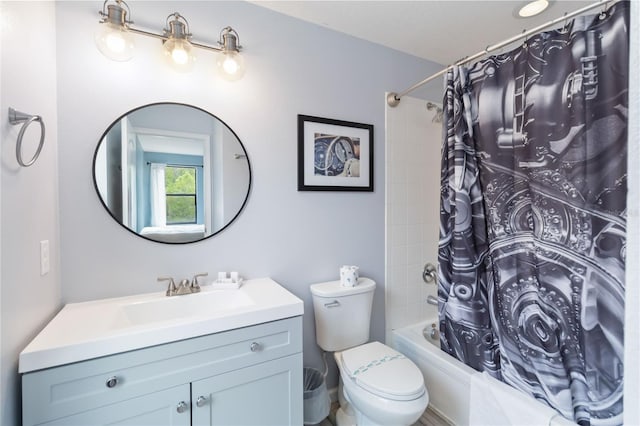 full bathroom with shower / tub combo, toilet, and vanity