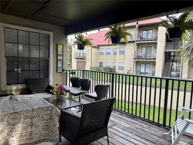 balcony with an outdoor hangout area