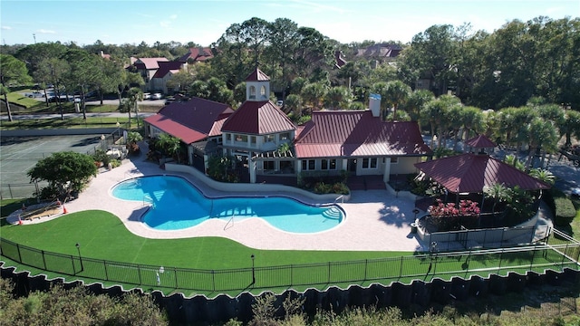 view of swimming pool featuring a patio