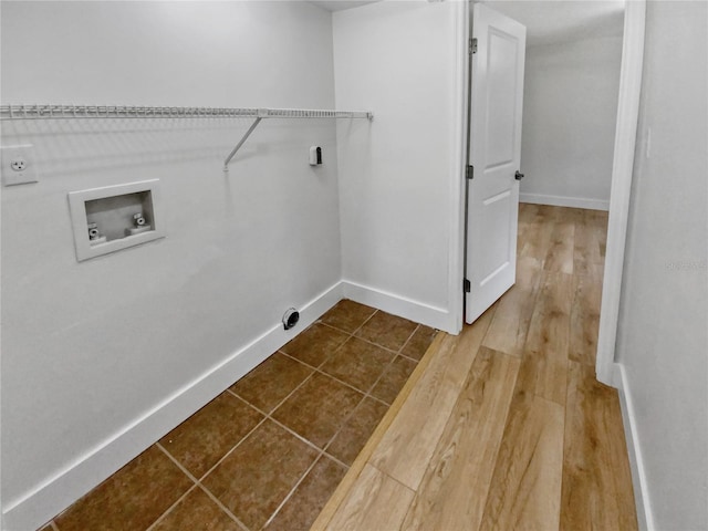 washroom featuring tile floors and hookup for a washing machine