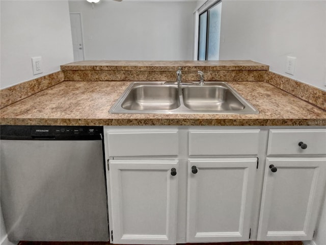 kitchen featuring ceiling fan, sink, white cabinetry, and stainless steel dishwasher