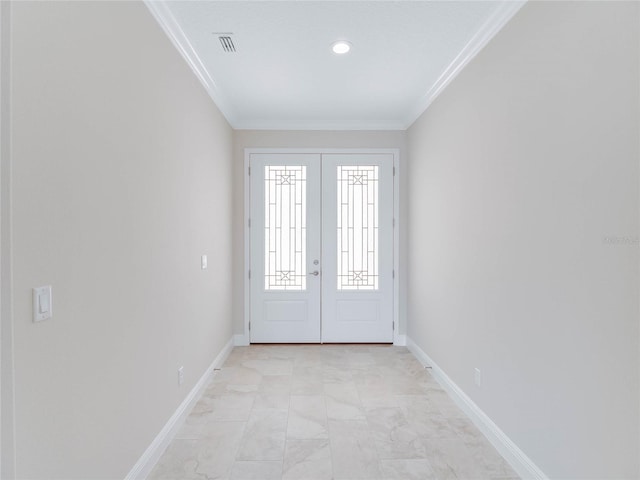 interior space with french doors and ornamental molding