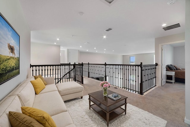 living room with light colored carpet