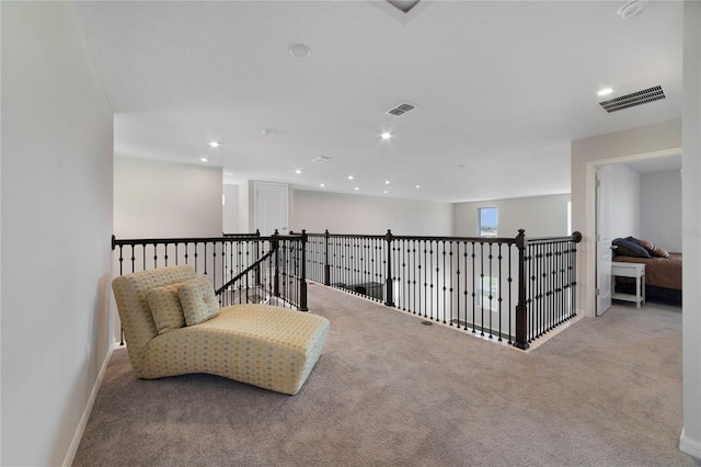 living area featuring carpet flooring