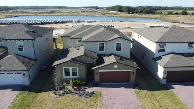 drone / aerial view featuring a water view