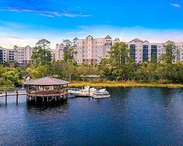 dock area featuring a gazebo and a water view