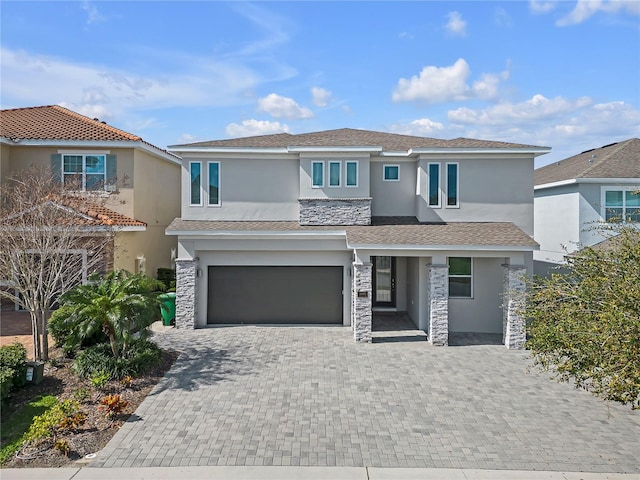 view of front of property featuring a garage