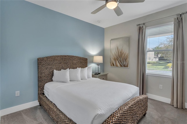 bedroom featuring ceiling fan and light colored carpet