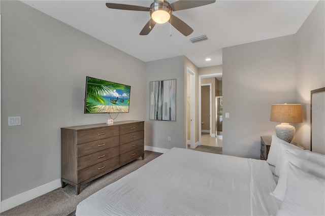 carpeted bedroom with ceiling fan