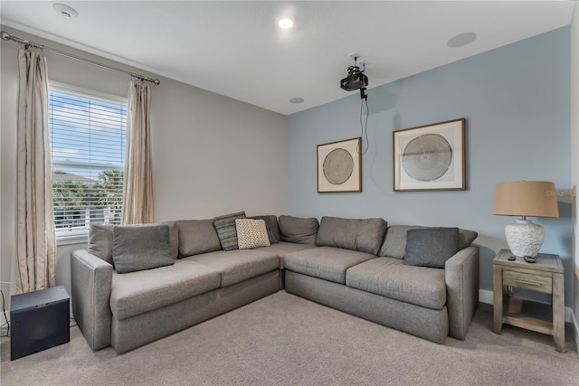 living room featuring light carpet