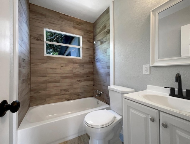 4011 Mesa Ave, Sarasota, FL 34233 - full bath featuring a textured wall, vanity, toilet, and tub / shower combination
