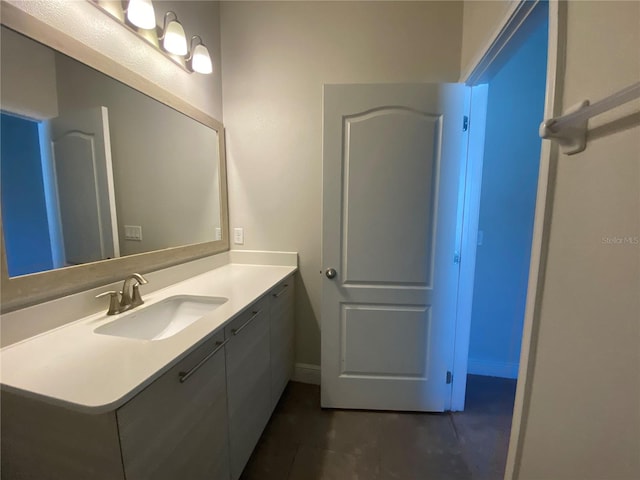 bathroom with tile floors and oversized vanity