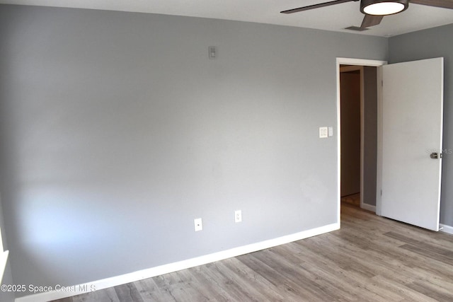 unfurnished room featuring ceiling fan and light hardwood / wood-style floors