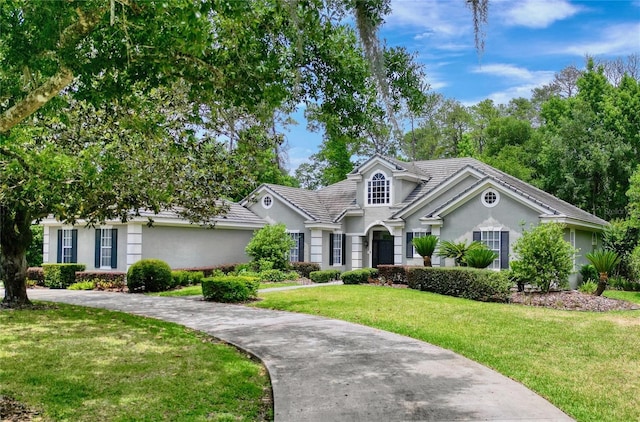 view of front of property with a front lawn