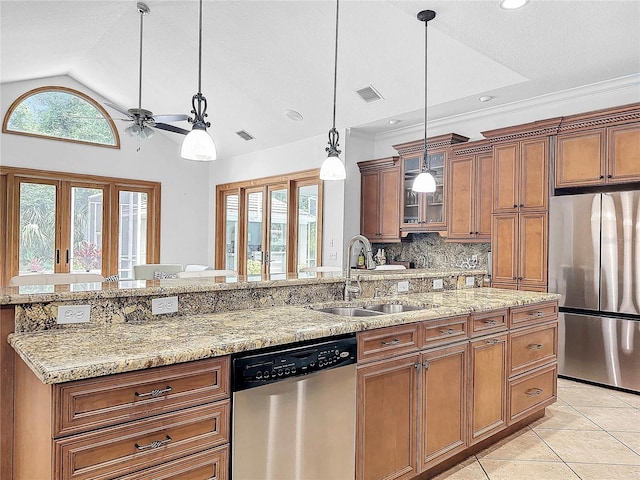 kitchen featuring french doors, ceiling fan, light tile patterned floors, decorative light fixtures, and stainless steel appliances