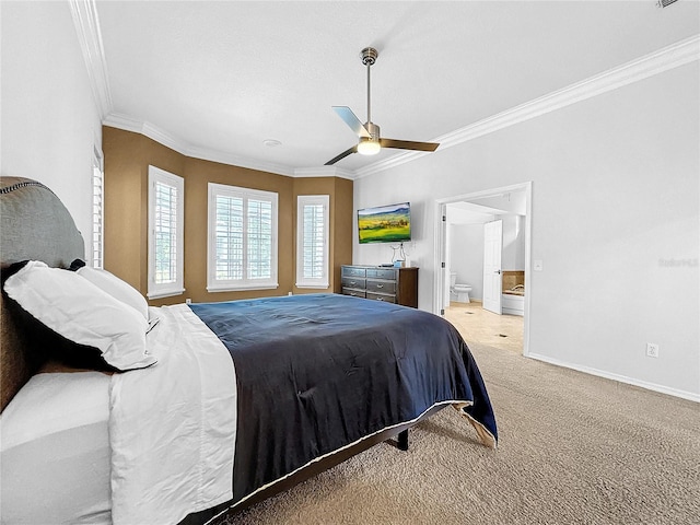 bedroom featuring ceiling fan, ornamental molding, ensuite bathroom, and light carpet