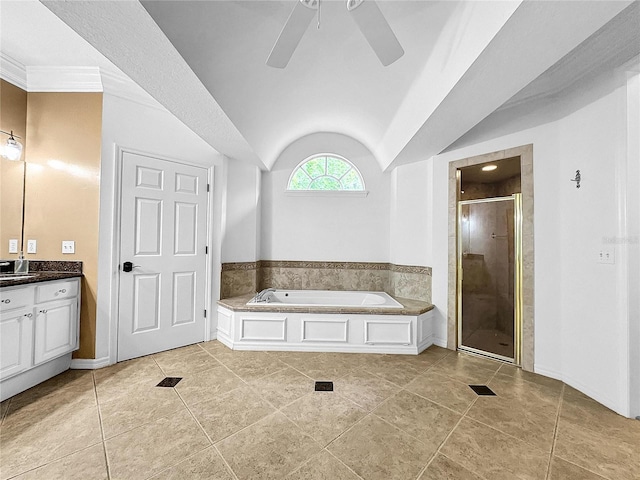 bathroom with vanity, tile patterned floors, vaulted ceiling, ceiling fan, and separate shower and tub