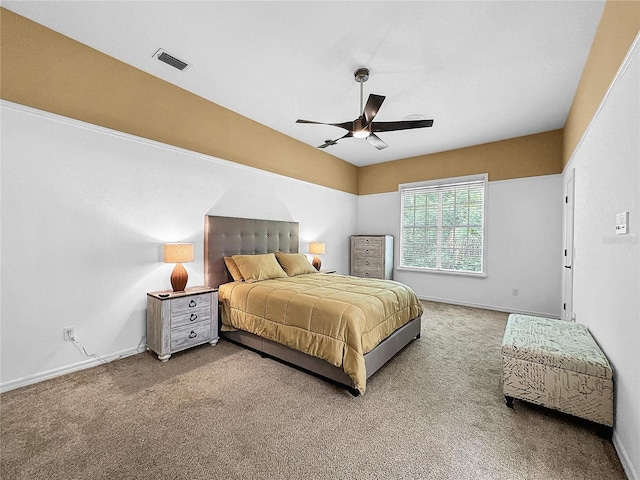 carpeted bedroom with ceiling fan