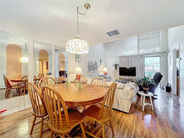 dining space featuring light hardwood / wood-style flooring