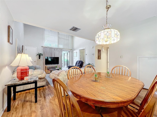 dining room featuring light hardwood / wood-style floors