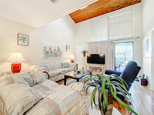 living room featuring light wood-type flooring, high vaulted ceiling, and wooden ceiling